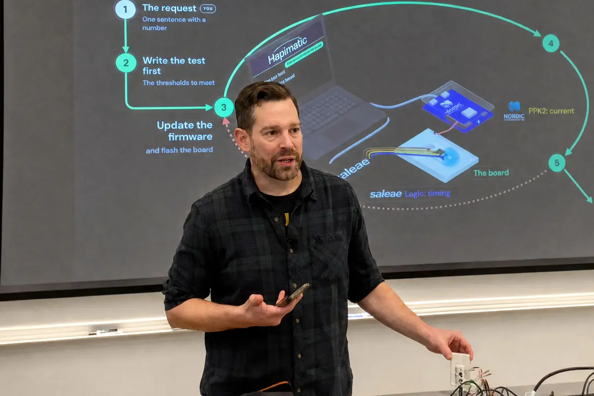 Matt Starfield introducing the live demo at Penn, phone in hand